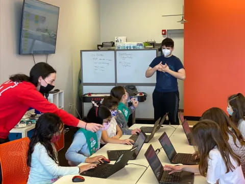 a group of people wearing masks