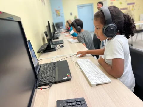 a few people working on computers