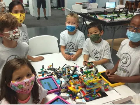a group of children wearing face masks