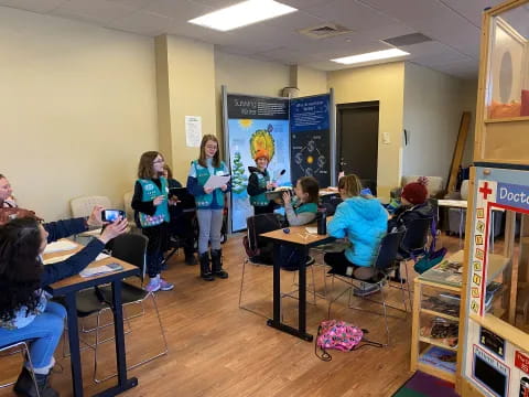 a group of people in a classroom