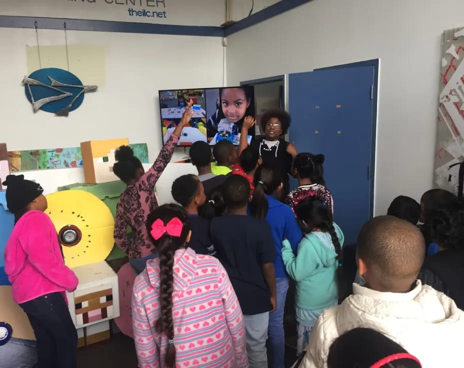 a group of children in a classroom