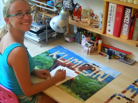 a woman sitting at a table