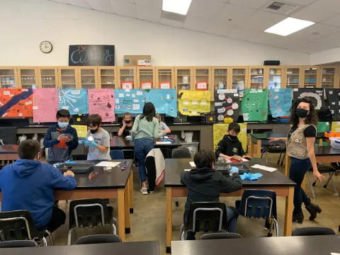 a group of people in a classroom