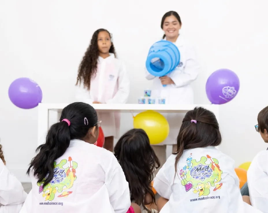 a group of girls in a room