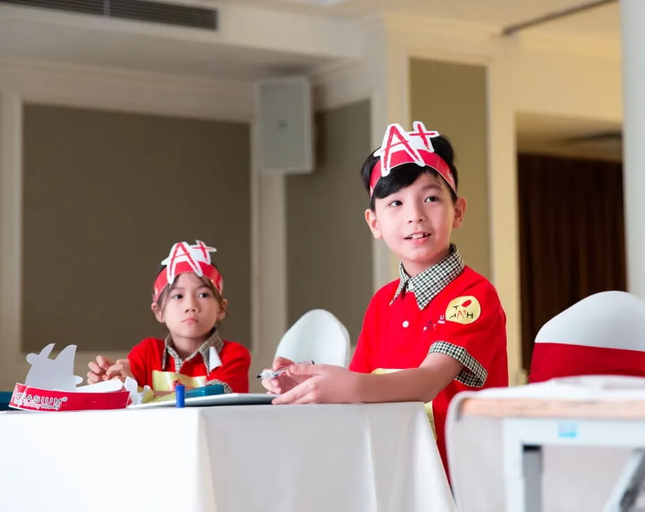 a couple of kids in uniform