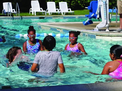 a group of people in a pool