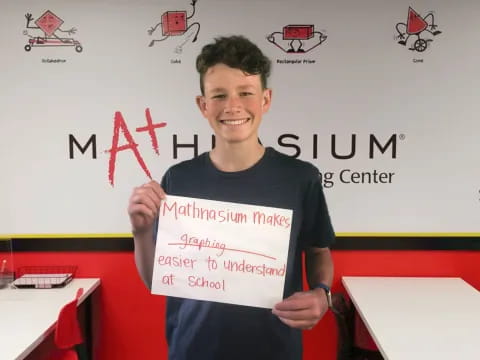 a person holding a sign