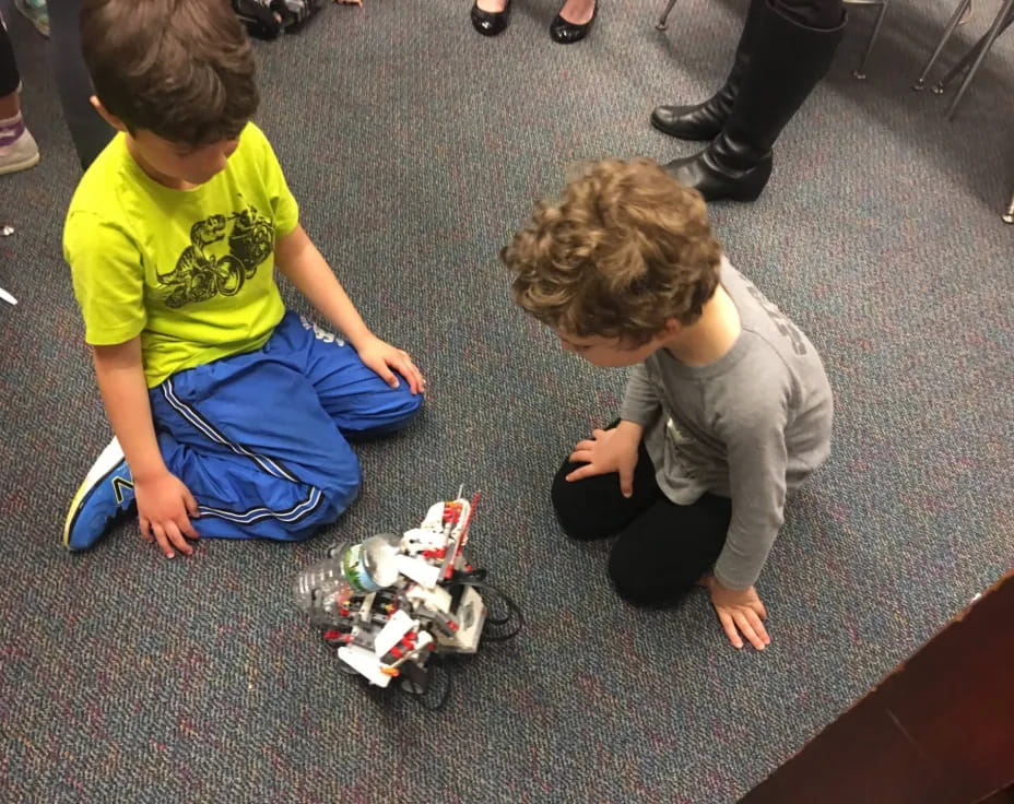 a couple of kids playing with toys