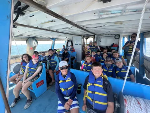 a group of people on a boat