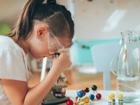 a person using a microscope