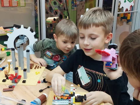 a group of kids playing with toys