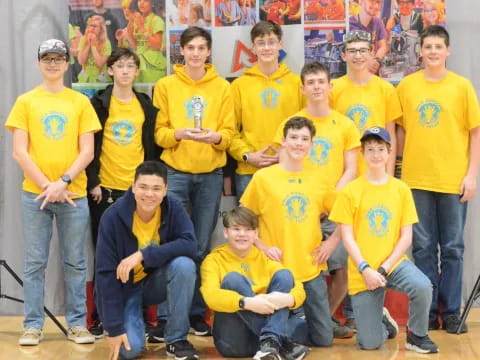 a group of people wearing matching t-shirts