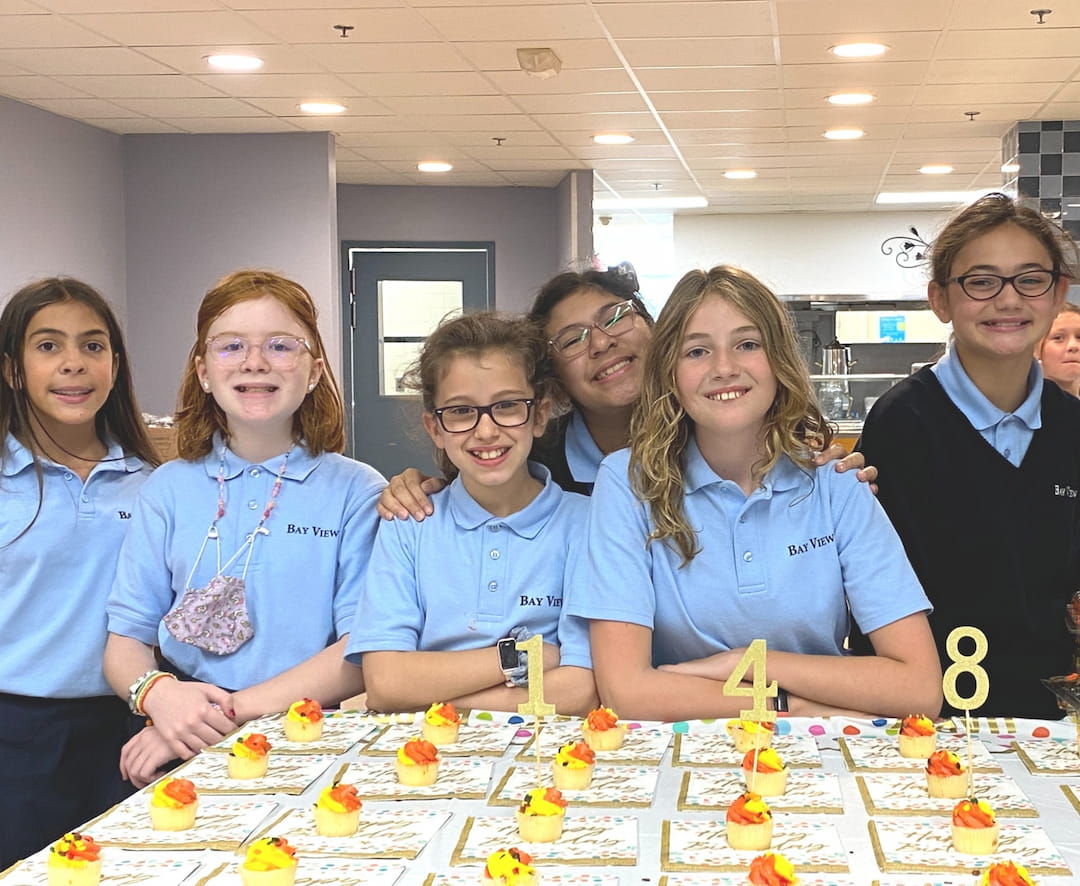 a group of people posing for a photo