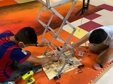 a few boys playing with toys