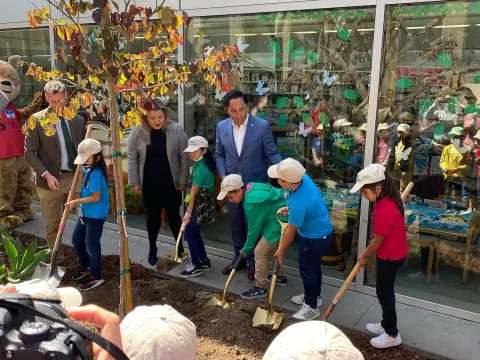 a group of people working outside