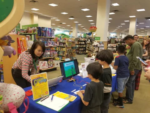 a group of people in a library
