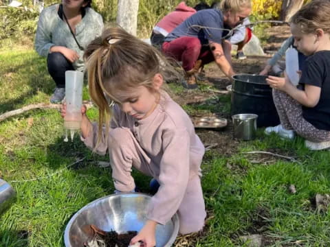 a group of people cooking outside