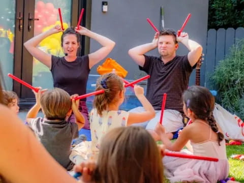 a group of children holding bows and arrows