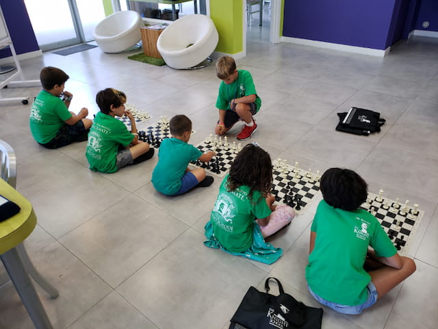 a group of children sitting on the floor