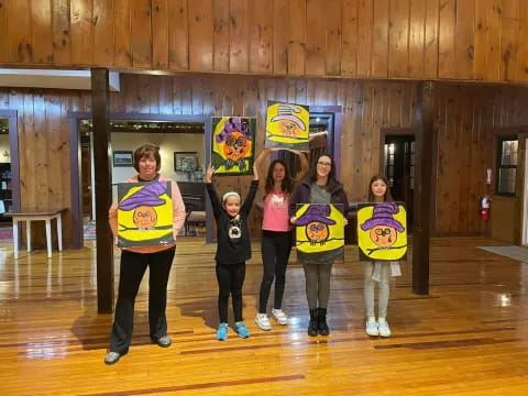 a group of people holding signs