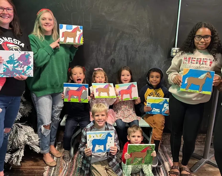 a group of children holding boxes