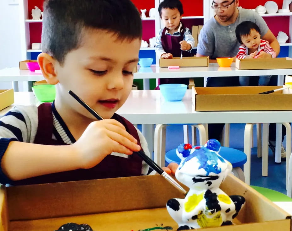 a young boy in a classroom