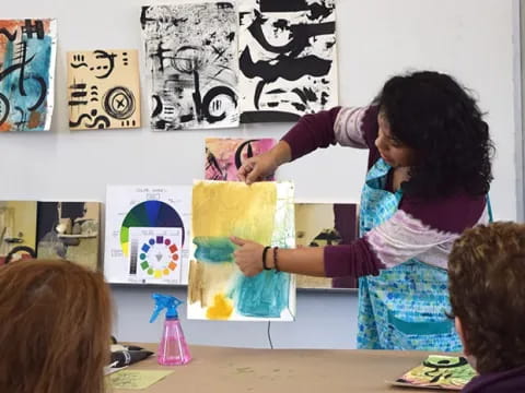 a person painting on a wall