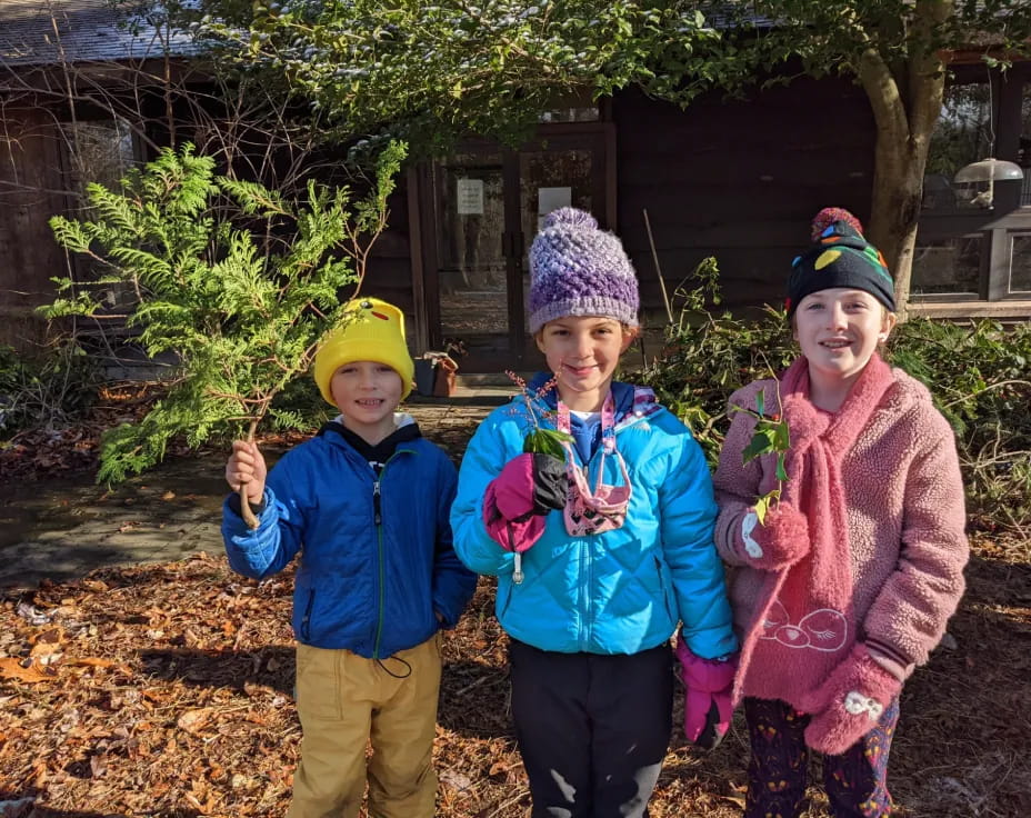 a group of children wearing hats