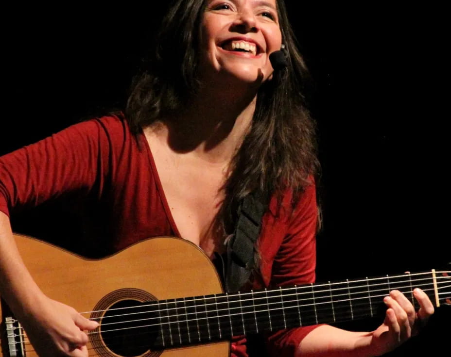 a person playing a guitar