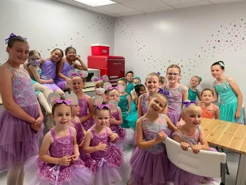 a group of people in dresses