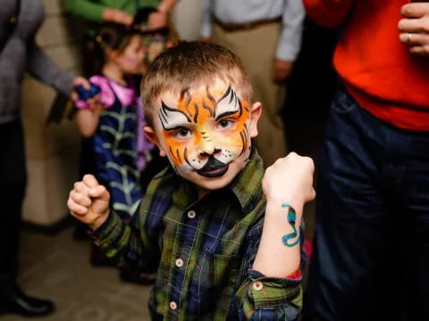 a boy with a painted face