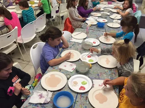 a group of people eating at a table