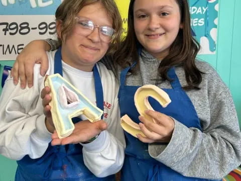 a couple of girls holding bananas