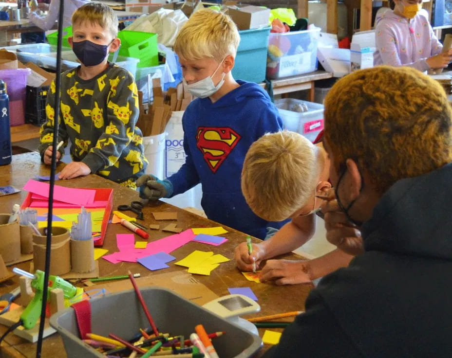 a group of people painting