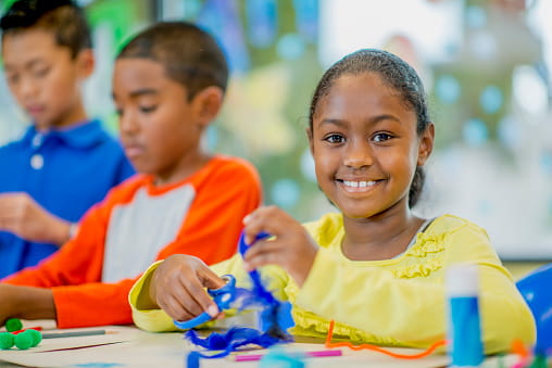 a group of children in a classroom