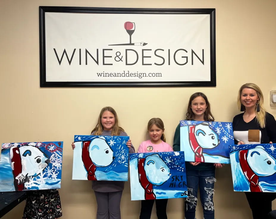 a group of girls holding signs