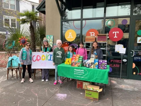 a group of people holding signs