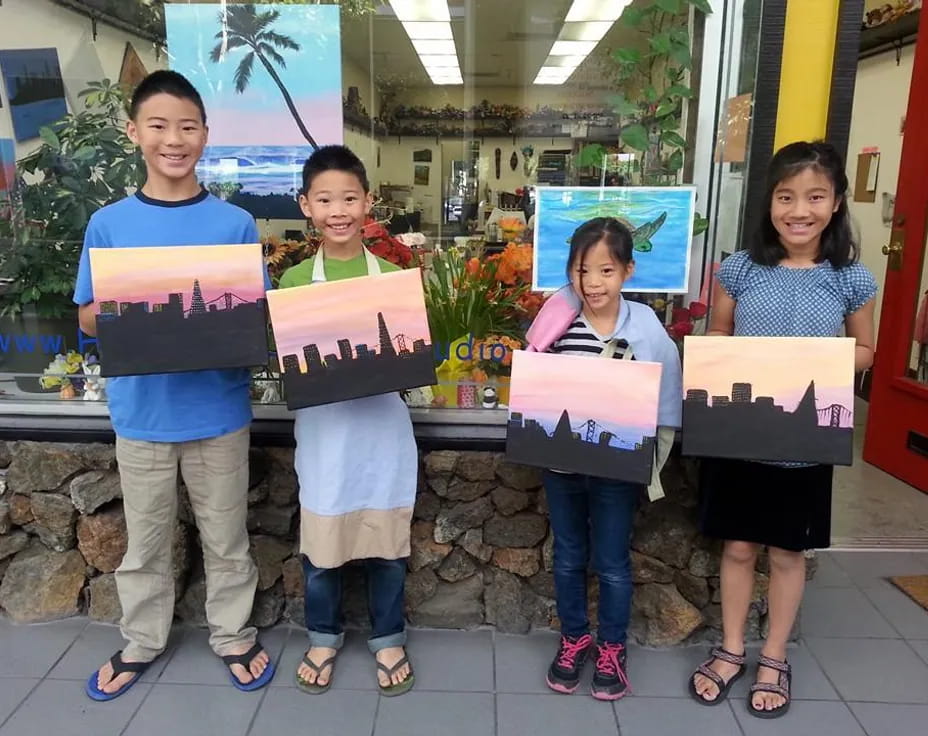 a group of children holding signs