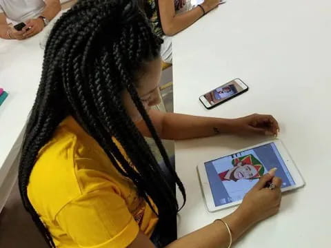 a person holding a tablet