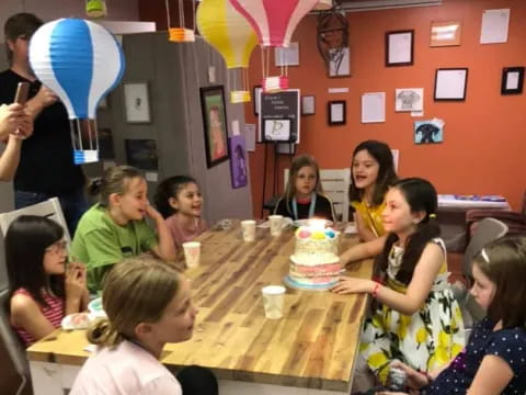 a group of people around a table