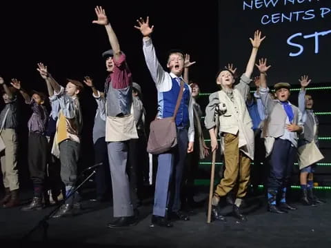 a group of people on a stage