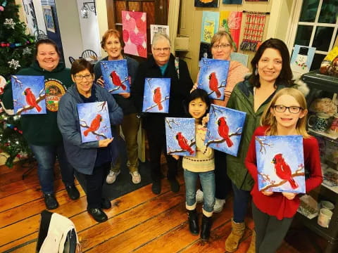 a group of people holding a sign