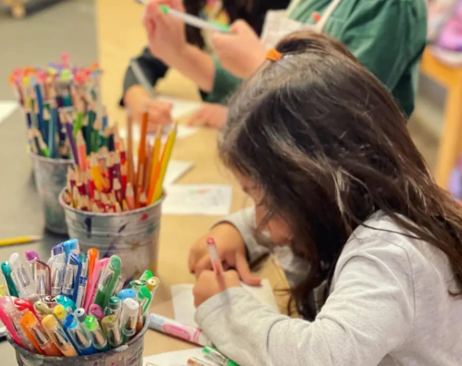 a young girl painting
