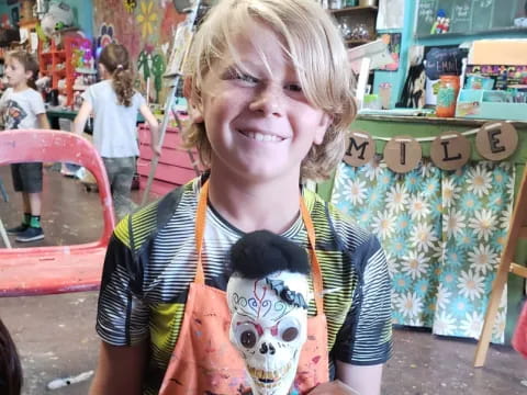 a girl holding a stuffed animal