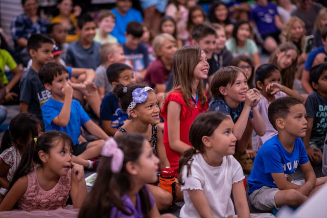 a group of children sitting together