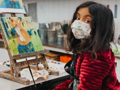 a person with a face mask