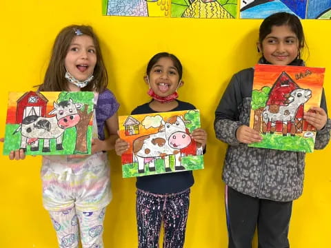 a group of girls holding books