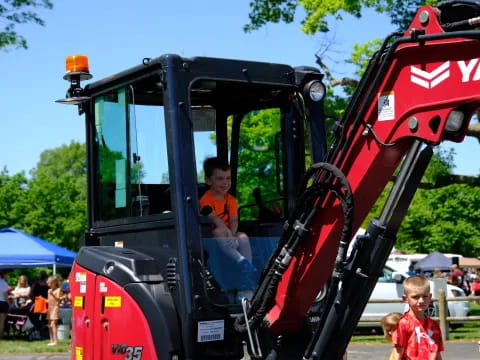 a kid stands in the door of a bus