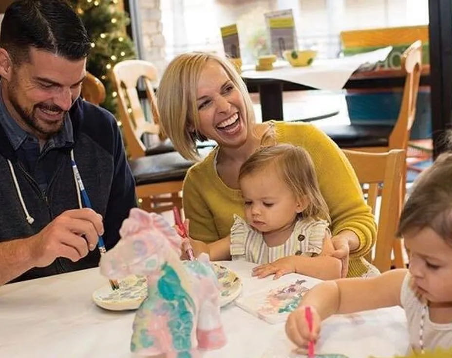 a family sitting at a table