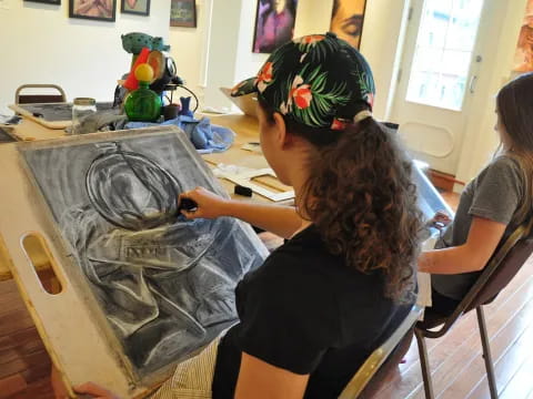 a group of people painting